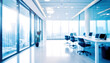 Beautiful blurred background of a light modern office interior with huge panoramic windows and beautiful cold lighting