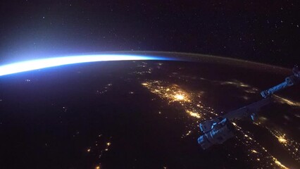Wall Mural - cities illumination at night seen from space. flying over planet earth. view from international spac