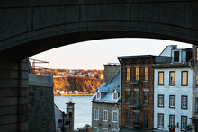 Urban Landscape Framed By An Arch During Golden Hour In Quebec, Canada