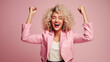 WOMAN in a pink suit standing on pink background, in the style of energetic and bold, princesscore, spirited portraits,