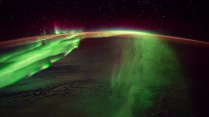 Wall Mural - aurora and northern lights over planet earth seen from space. view from international space station.