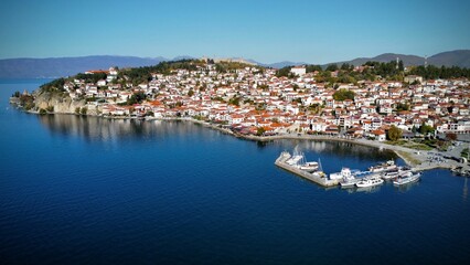 Canvas Print - Aerial view of the Ohrid cityscape on the lakeshore against a blue sky, in the Republic of Macedonia