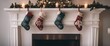 Christmas stockings hanging from fireplace mantel
