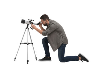 Astronomer looking at stars through telescope on white background