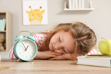 Wall Mural - Cute little girl with alarm clock sleeping at home