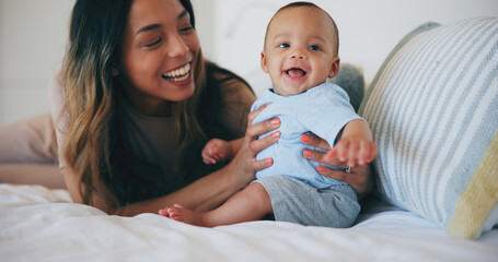 Wall Mural - Family, smile and a mother on the bed with her baby in their home together for care or bonding. Children, love and a happy young woman in the bedroom of an apartment with her adorable infant son