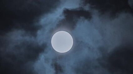 Wall Mural - mesmerizing time lapse of clouds and full moon. perfect for mystical and atmospheric content