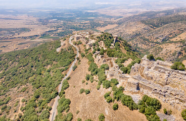 Wall Mural - Drone  view of the remains of the medieval fortress of Nimrod - Qalaat al-Subeiba, located near the border with Syria and Lebanon on the Golan Heights, in northern Israel