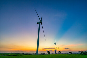 Panoramic view of wind farm or wind park, with high wind turbines for generation electricity with copy space. Green energy concept. Ninh Thuan, Vietnam