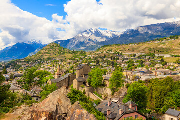 Canvas Print - Panoramic view from a hill over City of Sion with and Swiss Alps in Canton Valais, Switzerland