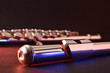 Flute detail on black table with lights and dark background