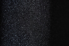 Texture Of Rough Black Plastic. Close Up Detail, Ultramacro Photo Of Dark Textured Material Patterns. Graphic Level, Black Asphalt.