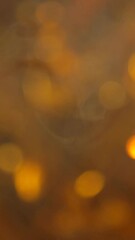 footage of smoke gold bokeh