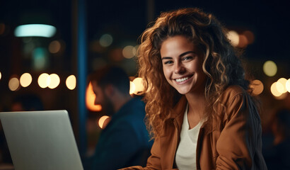 Poster - Happy woman working on laptop late at night, Smiling.