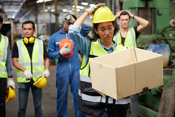 workers or engineer leaving the factory after losing a job