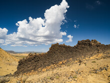 Hardened Mud Wall And Clouds Near Chaco Ruins, Rio Puerco Valley, New Mexico
