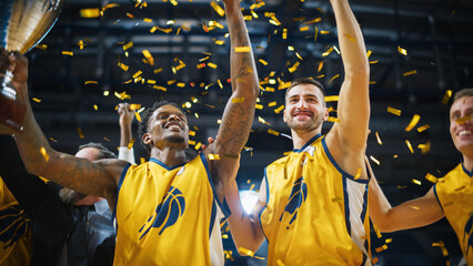 Wall Mural - Multiethnic Basketball Players Celebrate Championship Victory with Hugs, Jumping, Holding the Trophy High. Exclusive Joyful Sports Action on Live TV and Pay Per View Internet Streaming Concept.