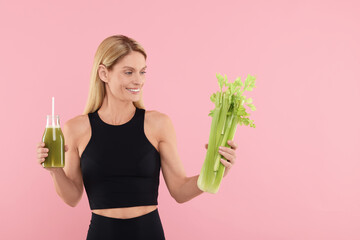 Sticker - Happy woman holding glass bottle with tasty celery juice and fresh vegetable on pink background. Space for text