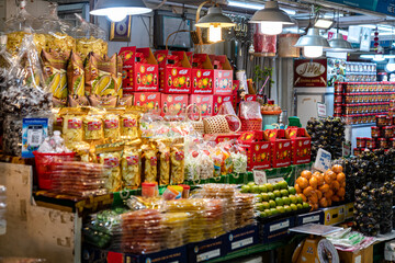 Wall Mural - Bangkok, Thailand - September 12, 2023: Thai street food, fresh fruits, drink, ice cream and smoothies, with varieties of the tasty food, selling along the road side at Chatuchak weekend market. 