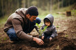 © Moritz - Young father teaching his son the value of nature and environmental education through planting a tree. Bonding through generations, cultivating a sense of responsibility and sustainability