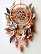 A dream catcher made of paper flowers and feathers