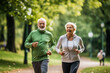 © Moritz - Elderly couple jogging in a park: Celebrating health and fitness in later life