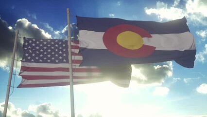 Wall Mural - The flags of the Colorado state and United States of America waving in the wind. American state. Concept of democracy and independence