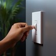 Finger turn off or on the light to saving electrical energy. Finger pushing light switch turn on or off. White switch