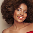 © Oleg Gekman - Beauty portrait of African American girl with afro hair. Beautiful black woman. Cosmetics, makeup and fashion