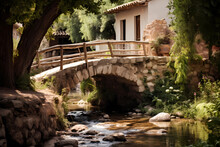 Stone Footbridge With Wooden Railing Over Fast Moving Mountain Stream In Quaint Village