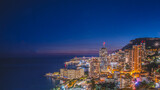 Fototapeta Morze - Panorama de nuit sur Monaco brillant de mille feux