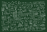 Fototapeta Koty - Hand drawn math science formulas on chalkboard background