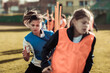 © Davor - Young female soccer player having practice with team in stadium