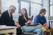 © qunica.com - Diverse team in modern workspace: better efficiency, and successful projects.