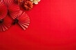 chinese lanterns with fan background on a red background with big copyspace area