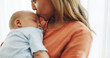 © Azeemud/peopleimages.com - Family, love and mother kiss baby for bonding, healthy relationship and childcare in home. Happy, childhood and mom and newborn infant embrace, care and relax together for affection and support