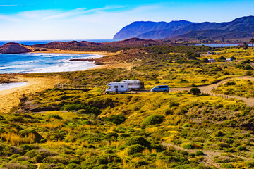  Coast view with camper rv camping on sea shore, Spain