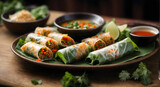 Fototapeta  - Spring rolls on plate with dipping sauce