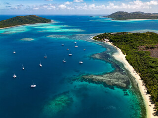 Wall Mural - sailing boats in bay of nanuya island, of fijian yasawa region.