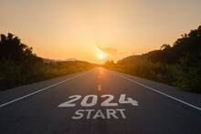 Happy New Year 2024,2024 Symbolizes The Start Of The New Year. The Letter Start New Year 2024 On The Road In The Nature Route Roadway Sunset Tree Environment Ecology Or Greenery Wallpaper Concept.