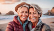 © Cagkan - Lesbian middle aged Caucasian couple at the beach on a romantic holiday. Love and relaxation.