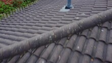 Drone 50fps. Fly Over A House Rooftop, Ceramic Roof Tiles. Filmed Yorkshire. UK 