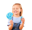 © Khushboo/peopleimages.com - Child, eating and lollipop candy smile for sweet tooth or sugar rush, treat or isolated transparent png background. Female person, kid or dessert as hungry taste or unhealthy snack food, fun or party