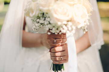 Canvas Print - bride holding bouquet