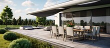 House Terrace With Synthetic Grass Flooring Tables Outdoor Seating Abundant Plants And An Extended Retractable Awning Copy Space Image Place For Adding Text Or Design