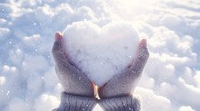 Overhead View Of Girl Holding Heart Made Of Snow