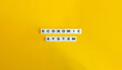 © photoopus - Economic System or Economic Order Term and Concept. Letter Tiles on Yellow Background. Minimal Aesthetics.
