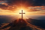 Fototapeta  - Creative religion concept. Cross at top of hill mountain with sunset ray dawn. glowing end clouds skies landscape. Christian religious