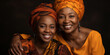 African woman with her baby on brown background, smiling and hugging, motherly love and care