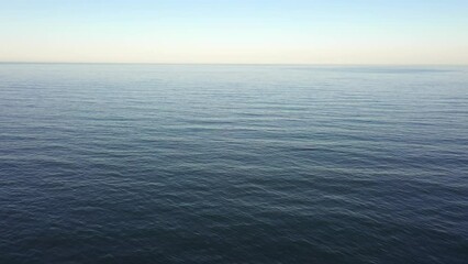 Canvas Print - Aerial beautiful sea background and calm blue sea horizon and clear sky seascape.